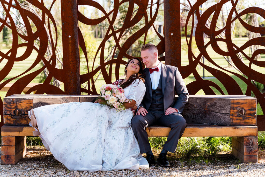 Share an intimate moment on one of the hand carved benches